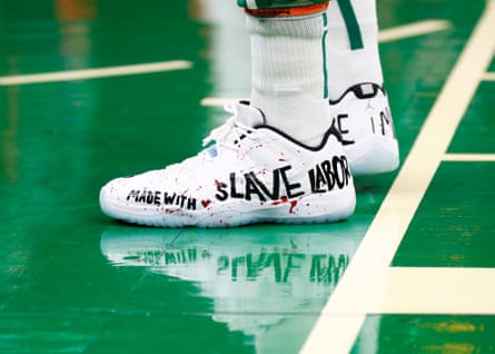Enes Kanter Freedom’s sneakers are seen earlier a 2021 crippled successful Boston.