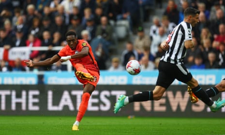 Brighton & Hove Albion's Danny Welbeck shoots at goal against Newcastle United.