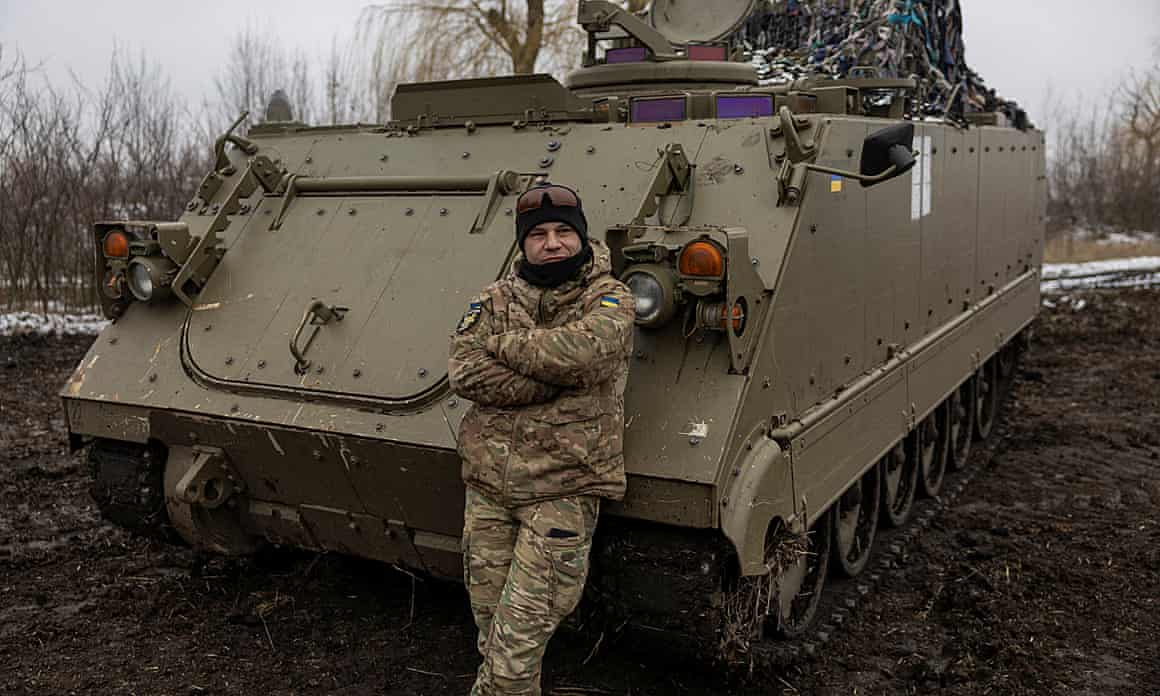Ukrainian serviceman with the call sign Tyson and his M113 APC in Dnipropetrovsk region.