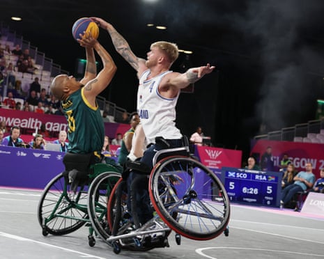 South Africa's Simanga Mbhele in action with Scotland's Tyler Baines in the wheelchair basketball.