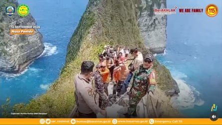 A police photo of emergency workers at the cliff