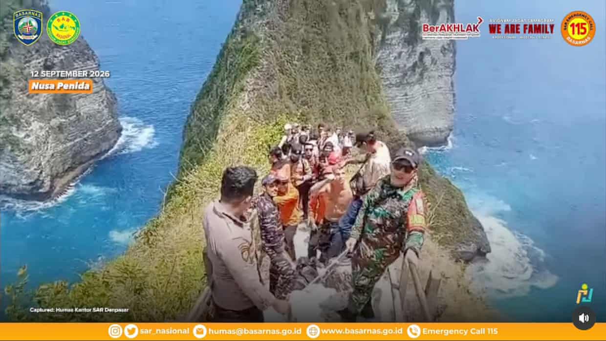 A police photo of emergency workers at the cliff