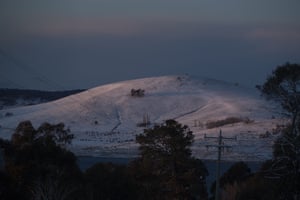 A heavy blanket of snow is seen at dawn in Old Adaminaby near the NSW Snowy Mountains. The Adaminaby Complex fire tore through the area in early January, causing massive damage to the region’s flora and fauna.