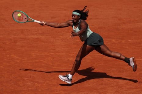 Baptiste plays a forehand.