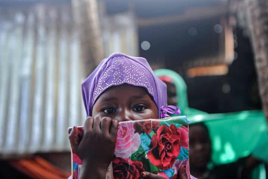A Somali girl attends a class in a makeshift school at a refugee camp in Mogadishu.