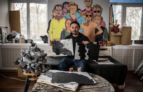 Ukrainian artist Oleksiy Sai shows off his recent work in his new studio in Kyiv, November 2022