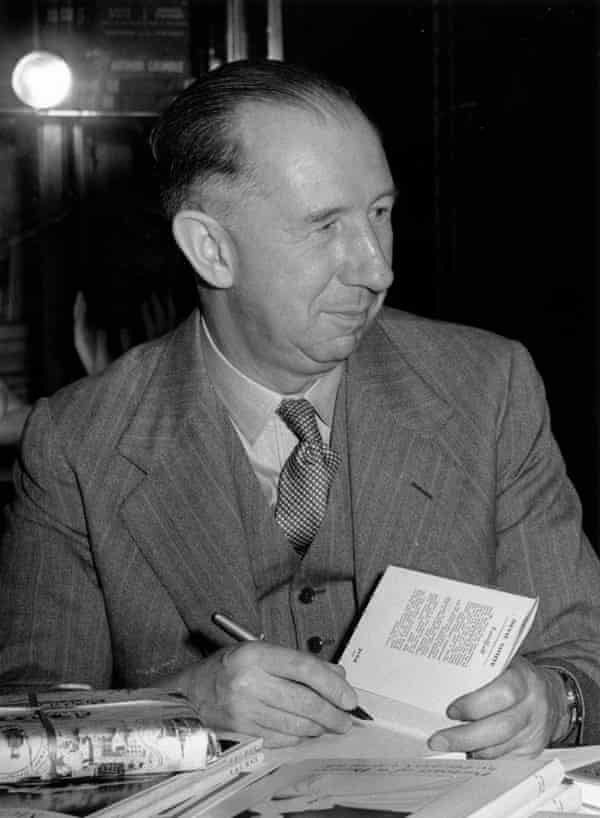 Nevil Shute signing books in 1953.