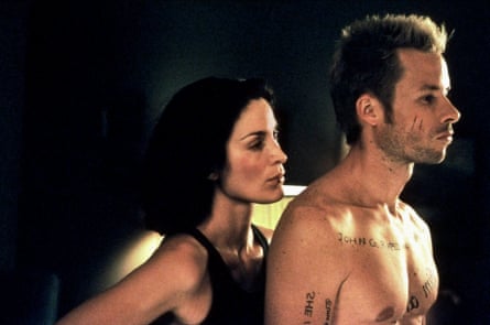 With Carrie-Anne Moss in Memento.