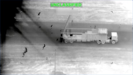 Night vision footage shows a large vehicle being targeted for attack.