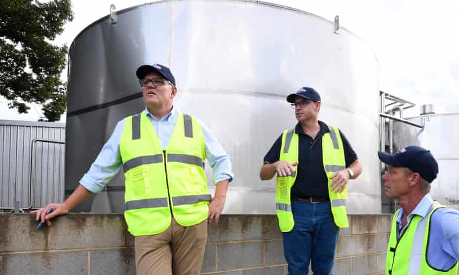 Scott Morrison tours the Norco Ice Cream Factory in Lismore with Michael Hampson (centre) and Mike Jeffery