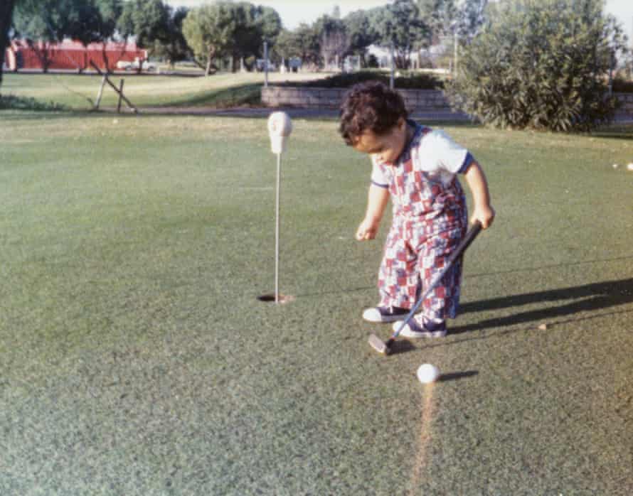 Tiger Woods practising his swing at 11 months old.