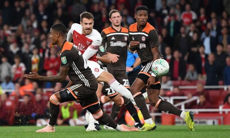 Aaron Ramsey fires in a shot in the midweek Carabao Cup win over Brentford, Arsenal’s sixth successive victory in all competitions.