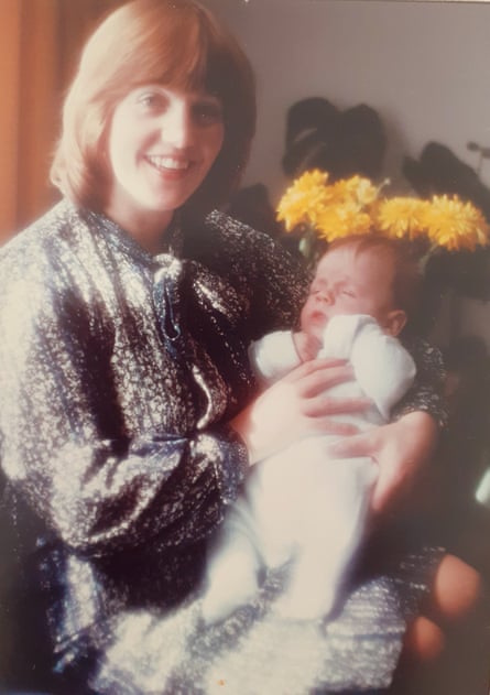 Grace MacDonald holding her baby son