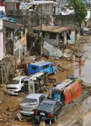 Damaged roads and buildings after Typhoon Ketsana in the Philippines, 2009