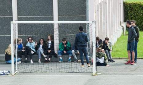 Students at Plouasne middle school in Brittany, France, which banned the use of mobile phone on its grounds four years ago.