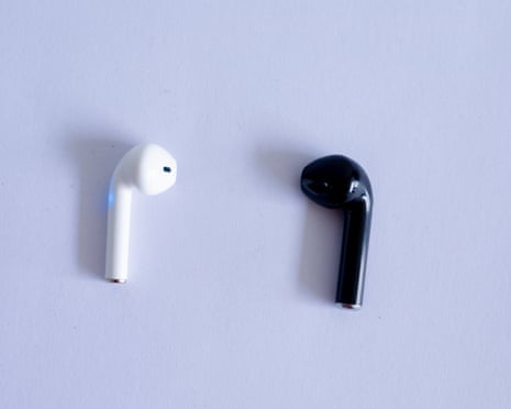 White and black wireless headphones on white background