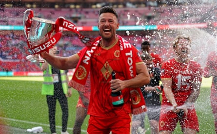Whitstable’s player-manager Jamie Coyle celebrates his team’s victory in the FA Vase final