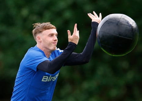 Cole Palmer throws a large black ball in training with Chelsea.