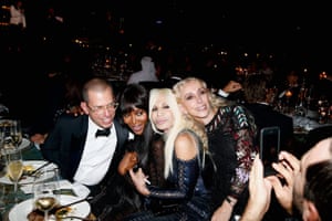 Sozzani with Jonathan Newhouse, Naomi Campbell and Donatella Versace in 2013.