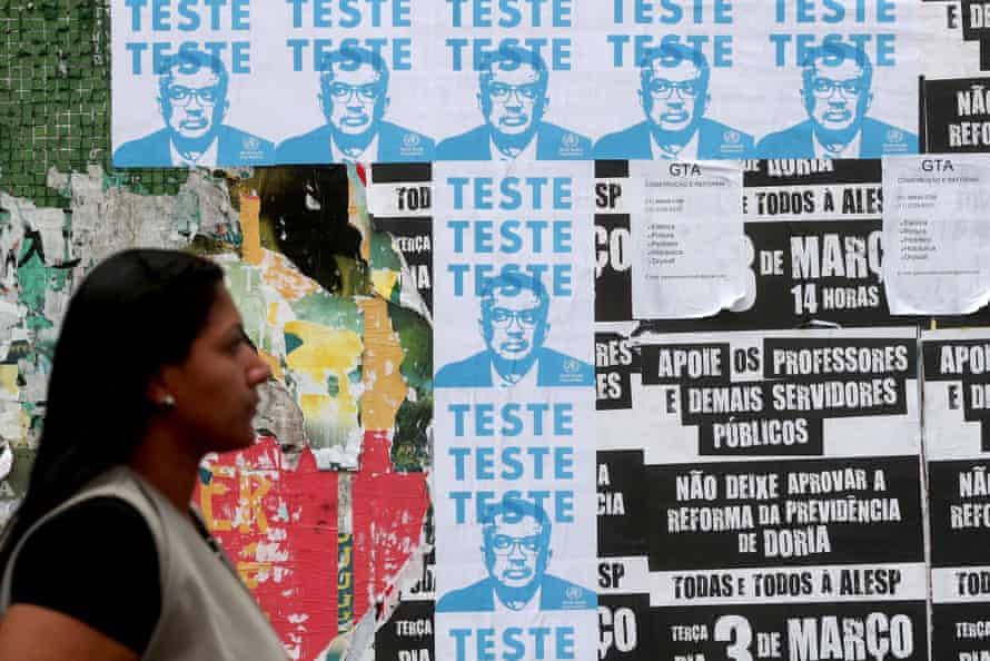 Posters of WHO chief Tedros Adhanom in Sao Paulo, Brazil last week.