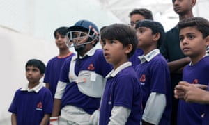 boys in cricket kit