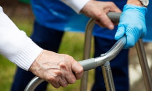 And old person with a carer
