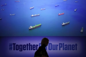 A person is silhouetted during Cop26