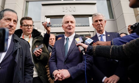 a group of people in suits outside a building