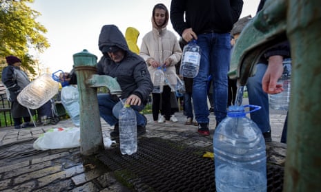 People take water from a water pump in Kyiv, Ukraine on 31 October.