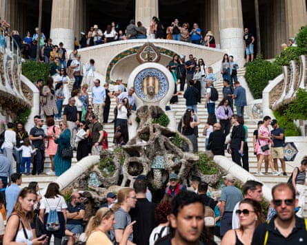 Tourists visit Park Guell in Barcelona.