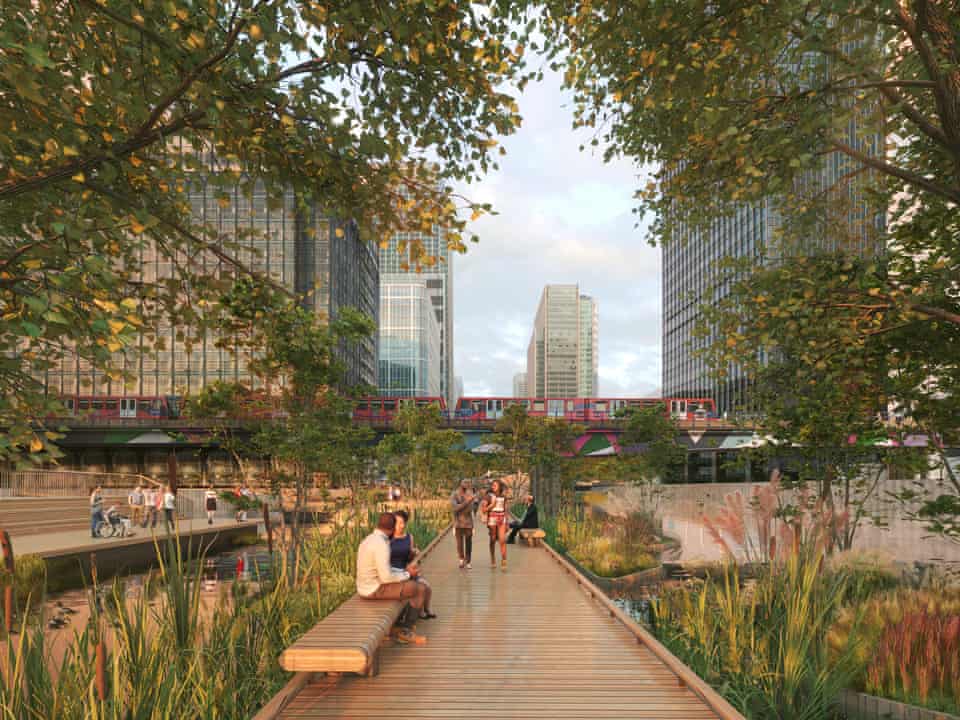 People walk along Middle Dock, Canary Wharf