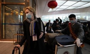 Thea Koelsen Fischer of the World Health Organization team arrive at the airport to leave at the end of the WHO mission in Wuhan, China
