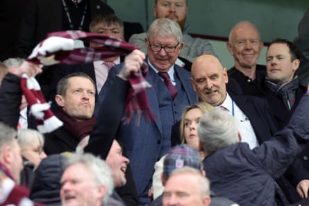Alex Ferguson takes his seat in the stands at Tynecastle