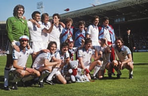 The West Ham United team posing with the trophy after their FA Cup Final victory over Arsenal at Wembley Stadium