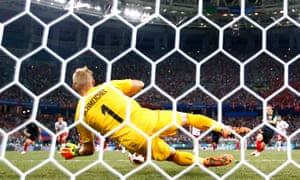 Schmeichel saves a penalty from Luka Modric in the 2018 World Cup shootout against Croatia.