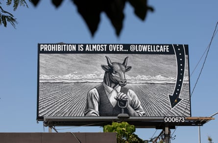 A billboard announces the opening of Lowell Cafe in West Hollywood.
