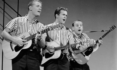 Bob Shane, centre, with Dave Guard, left, and Nick Reynolds performing as the Kingston Trio on the Bell Telephone Hour radio show in 1959. 