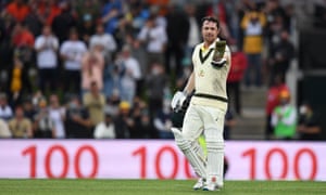 Travis Head of Australia celebrates scoring a century.