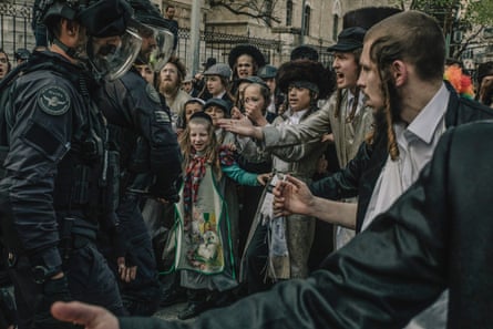 Haredi families confront members of the Israel police force