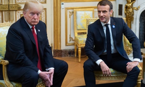 Donald Trump speaks with French president Emmanuel Macron prior to their meeting at the Elysee Palace in Paris on 10 November.