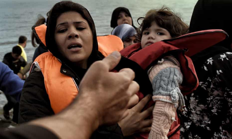 Refugees arrive on Greek island Lesbos from Turkey