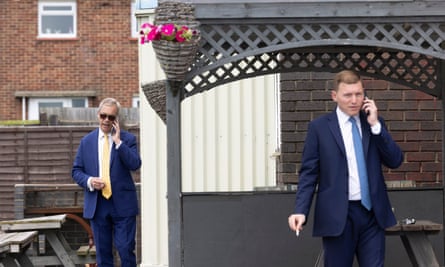 Nigel Farage and George Cottrell are pictured on the phone, cigarette in hand in a beer garden in Clacton in June