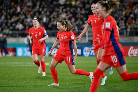 Guro Reiten (centre) celebrates after scoring Norway equaliser against Japan.
