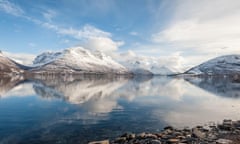 Mountains reflecting on water, Lyngen Alps, Arctic Norway.