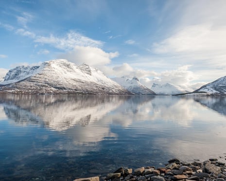 Mountains reflecting on water, Lyngen Alps, Arctic Norway.