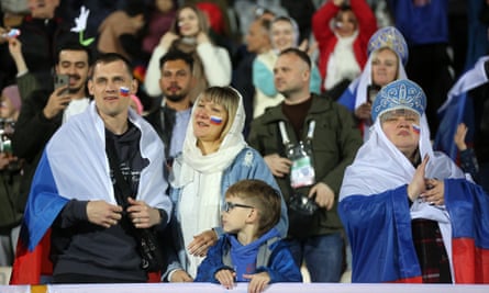 Russia fans watch the match against Iran in the Azadi Stadiu