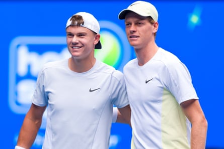 Jannik Sinner and Rune pose for a photo at the Australian Open.