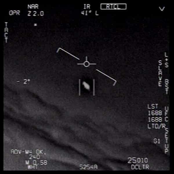 Video captures taken from unclassified U.S. Navy videos authorized by the U.S. Department of Defense show interaction with