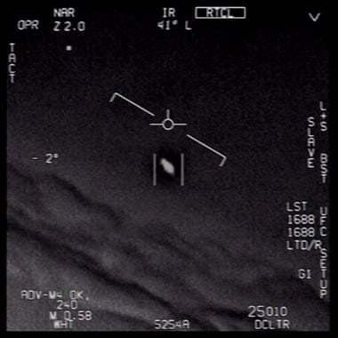A video grab image taken from an unclassified US navy video authorized for release by the US Department of Defense shows interactions with ‘unidentified aerial phenomena’.