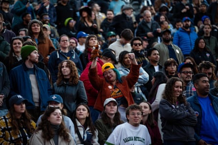 people stand in a crowd